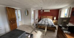 A vendre une villa de ville T5 en R+1 offrant une superbe vue sur mer à L’Etang Salé