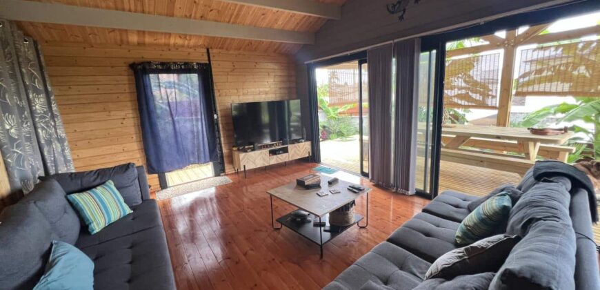 À vendre : Charmante villa bois F3 de plain-pied avec vue sur l’océan, dans un cadre idyllique à Saint-Louis