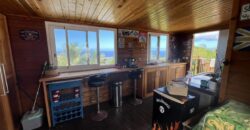 A vendre une charmante villa bois F3+ avec vue imprenable et dépendance à Etang Salé Les Hauts