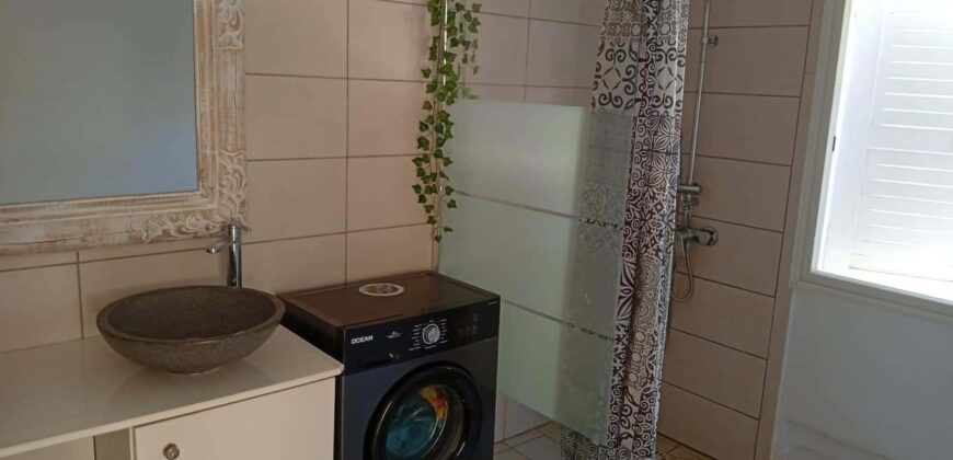 En vente une maison F4 de plain pied de 114m2 sur une parcelle de 694m2 pied dans l’eau à Saint Paul