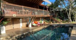 A vendre une villa d’architecte + studio indépendant avec piscine et jardin à La Montagne