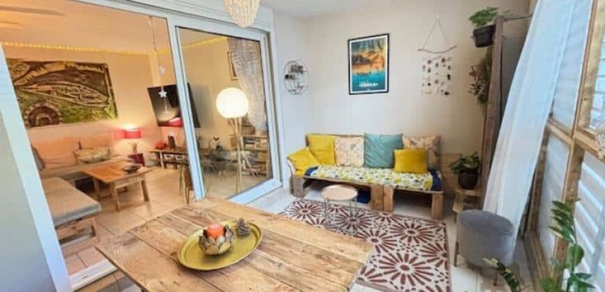 A vendre un lumineux appartement T2 situé en plein centre de La Montagne