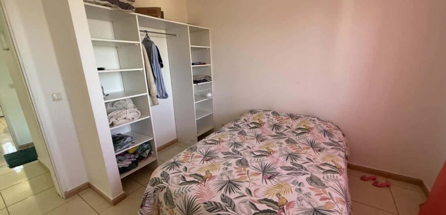 En vente une charmante villa composée de deux logements T4 + T2 sur un terrain de 625 m2 située à l’entrée du Tévelave