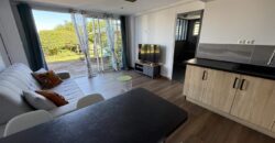 En vente une charmante villa composée de deux logements T4 + T2 sur un terrain de 625 m2 située à l’entrée du Tévelave