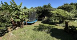 En vente une charmante villa composée de deux logements T4 + T2 sur un terrain de 625 m2 située à l’entrée du Tévelave