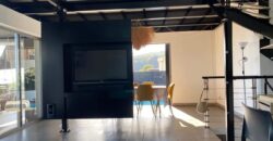 A vendre une villa d’exception de 216 m² avec piscine, offrant une vue imprenable sur la mer et la ville de La Possession