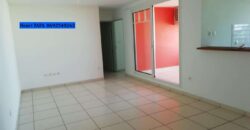 En vente un appartement T2 avec petit jardin situé dans une résidence sécurisée à Saint Joseph