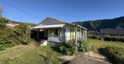 A vendre une villa F5 avec garage sur un vaste terrain de plus de 2000m2 à Plaines des Palmistes
