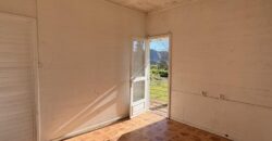 A vendre une villa F5 avec garage sur un vaste terrain de plus de 2000m2 à Plaines des Palmistes