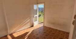 A vendre une villa F5 avec garage sur un vaste terrain de plus de 2000m2 à Plaines des Palmistes