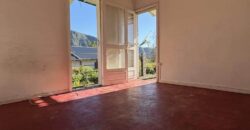 A vendre une villa F5 avec garage sur un vaste terrain de plus de 2000m2 à Plaines des Palmistes