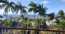 En vente une grande villa familiale de 150m2 sur un vaste terrain de 1000m2 avec belle vue sur mer à Sainte Clotilde