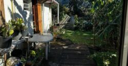 En vente une maison de type bourbon bois sur un terrain de 409m2 au 2ème village de la Plaine des Palmistes