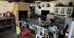 En vente une maison de type bourbon bois sur un terrain de 409m2 au 2ème village de la Plaine des Palmistes