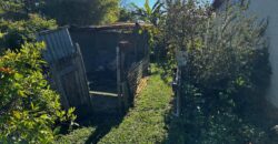 En vente une maison de type bourbon bois sur un terrain de 409m2 au 2ème village de la Plaine des Palmistes