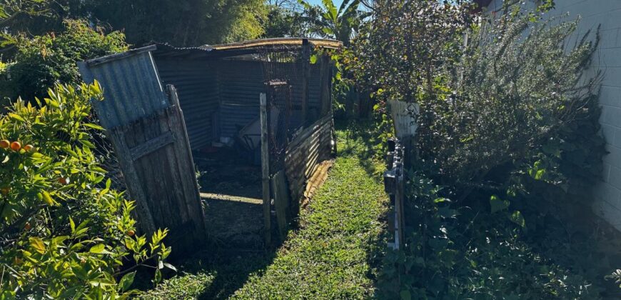 En vente une maison de type bourbon bois sur un terrain de 409m2 au 2ème village de la Plaine des Palmistes