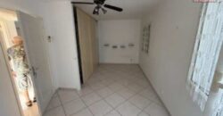 En vente un bel appartement F3/4 en rez-de-jardin d’un immeuble à La Possession