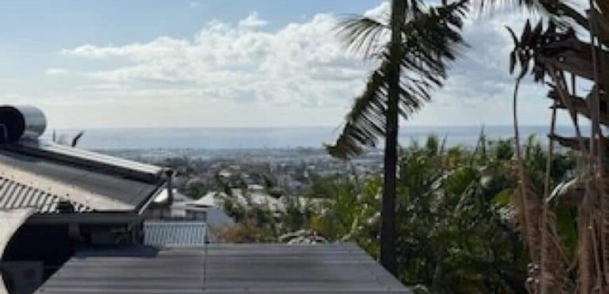 En vente un bel appartement F3/4 en rez-de-jardin d’un immeuble à La Possession