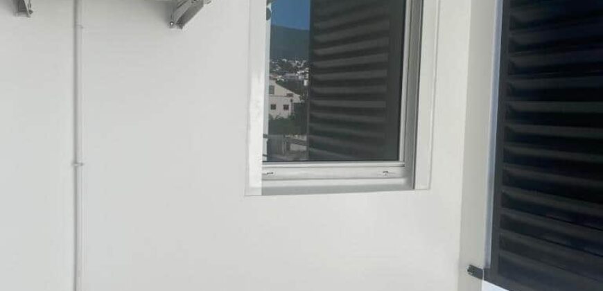 À vendre un appartement avec terrasse dans une résidence à Sainte Clotilde