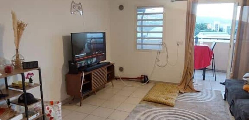 En vente un appartement T2 de 49.21 m2 situé dans une résidence sécurisée à Sainte Clotilde