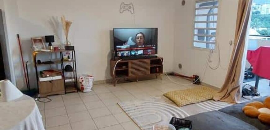 En vente un appartement T2 de 49.21 m2 situé dans une résidence sécurisée à Sainte Clotilde