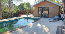 À vendre une villa F5 de 152 m2 avec piscine sur un vaste terrain de 1467 m2 située à Saint Paul