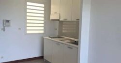 À vendre appartement de type F1 avec terrasse et parking en sous-sol à Sainte-Clotilde Réunion